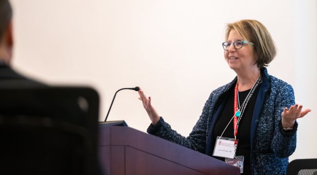 Dr. Lynn Schnapp at podium