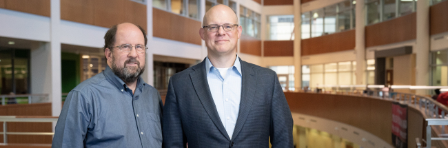 A clinical trial led by Christopher Crnich, MD, PhD, associate professor, Infectious Disease (pictured above, on right), and James Ford, PhD, assistant professor, Social and Administrative Science, University of Wisconsin–Madison School of Pharmacy (pictured above, on left), will compare strategies for implementing a toolkit aimed at improving urinary tract infection (UTI) management in Wisconsin nursing homes