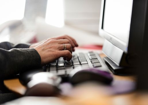 typing at computer